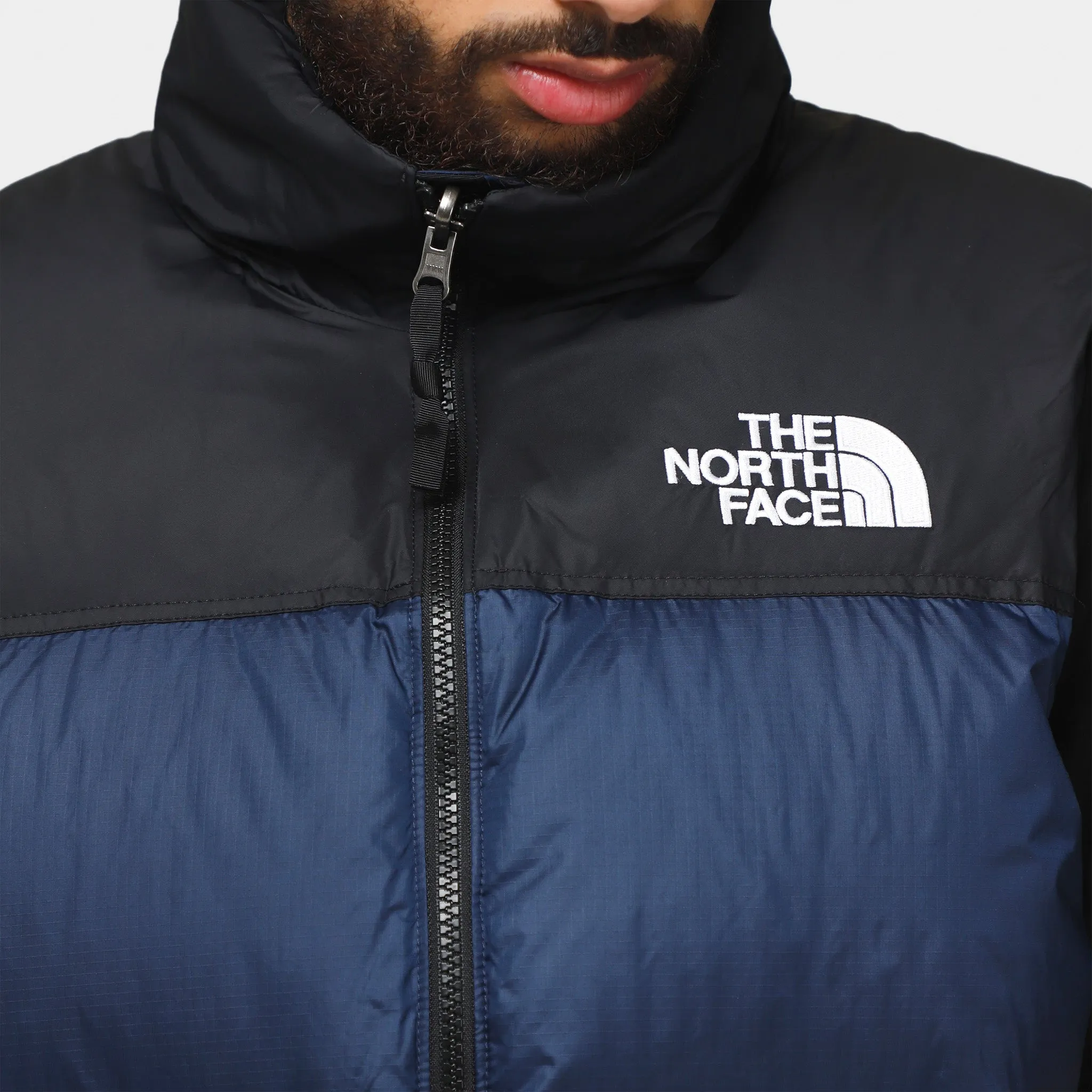 The North Face 1996 Retro Nuptse Vest Summit Navy / TNF Black